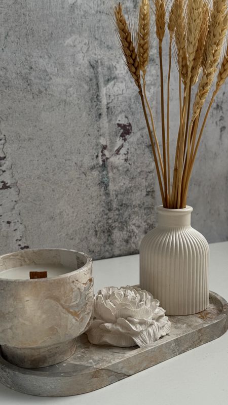 Decor set with candle, vase and peony on stand