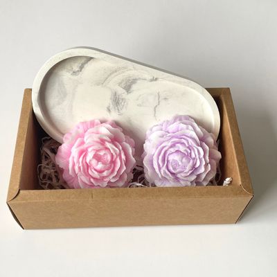 Set of decorative candles on a stand.