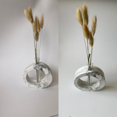 Vase for dried flowers with a flask.