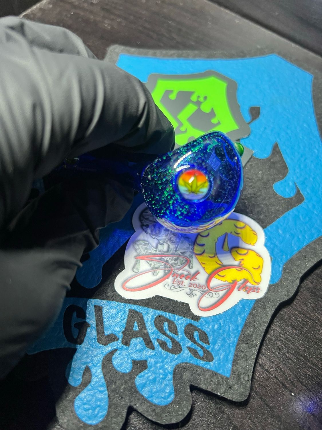 Snook Glass Emerald Green Dichroic Spoon With Ganja Millie And Chromium Accents.