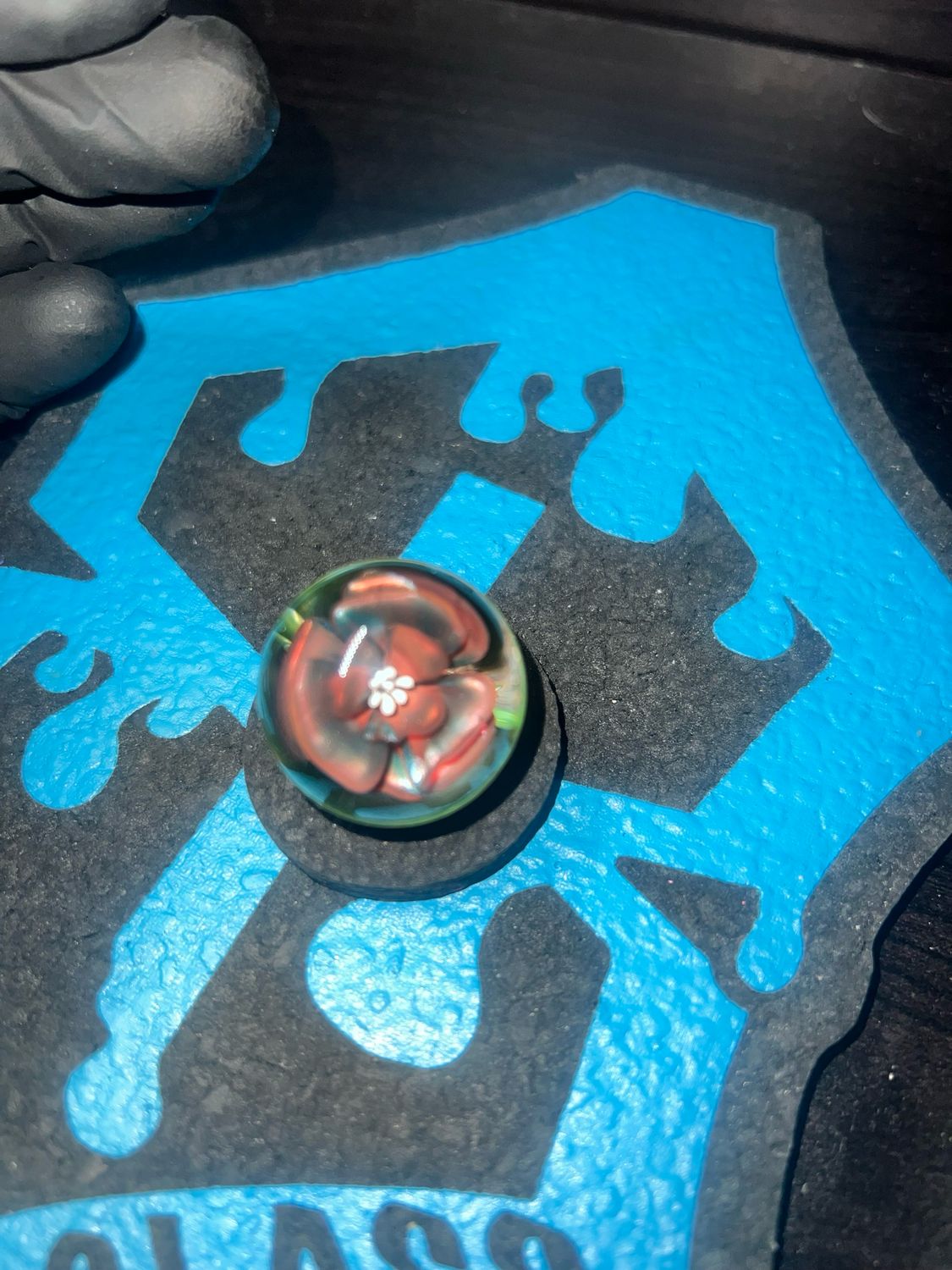 Snook Glass 29mm Neptunium/red Elvis Marble