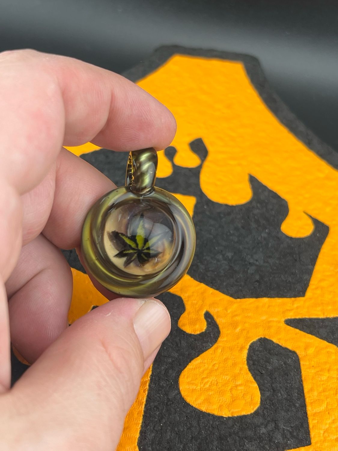 Summer series offering #53. Up for grabs is this ganja leaf pendant
