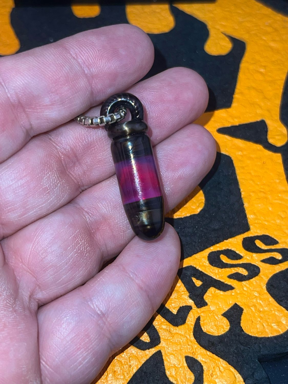 Snook Glass Bullet Pendant. Royal Jelly/Electrum