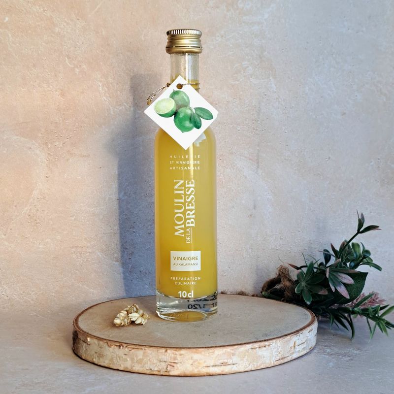 Vinaigre aromatisé à la pulpe de Kalamansi Vinaigre aromatisé à la pulpe de Kalamansi