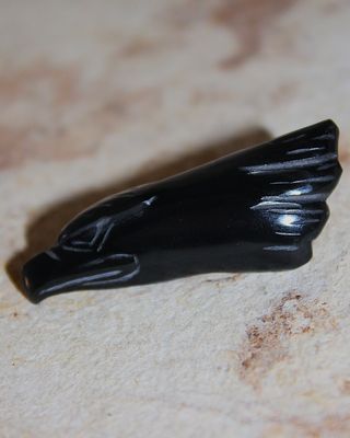 CABEZA DE AGUILA DE OBSIDIANA