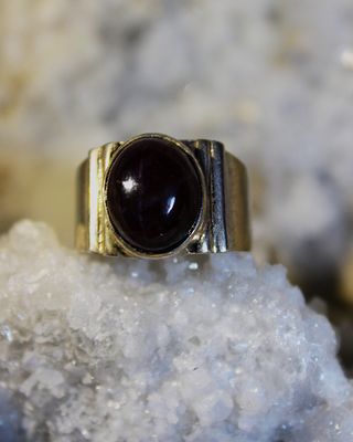 ANILLO DE PLATA CON GRANATE ESTRELLA