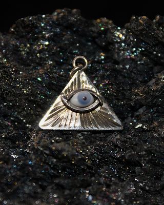 DIJE DE PLATA OJO DE LA ABUNDANCIA