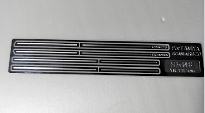 Laser cut metal side panel