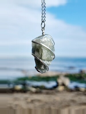 NATURAL GREEN AVENTURINE QUARTZ POINT PENDANT. WITH SILVER COLOUR SPIRAL.  