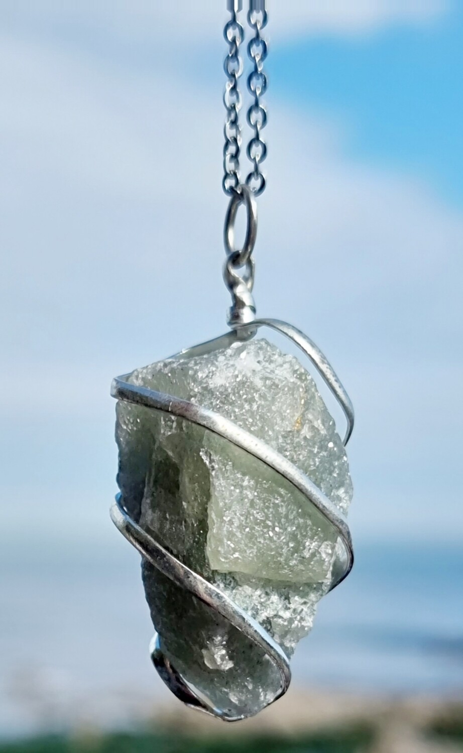 NATURAL GREEN AVENTURINE QUARTZ POINT PENDANT. WITH SILVER COLOUR SPIRAL.  