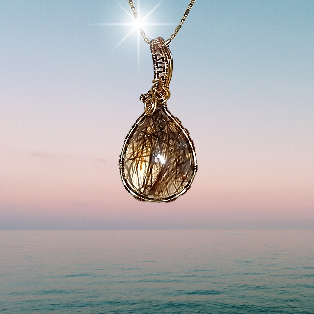 Rutilated Quartz crystal Amulet 