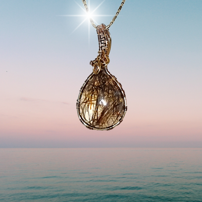 Rutilated Quartz crystal Amulet 