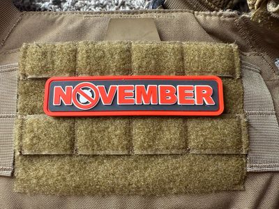 The No Nut November Patch mounts easily to velcro panels