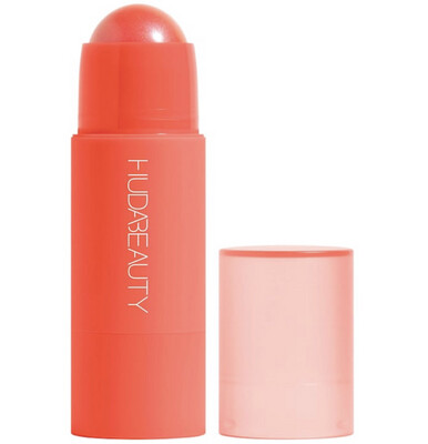 Huda Beauty - Cheeky Tint Cream Blush Stick | Coral Cutie - a bright orange-pink