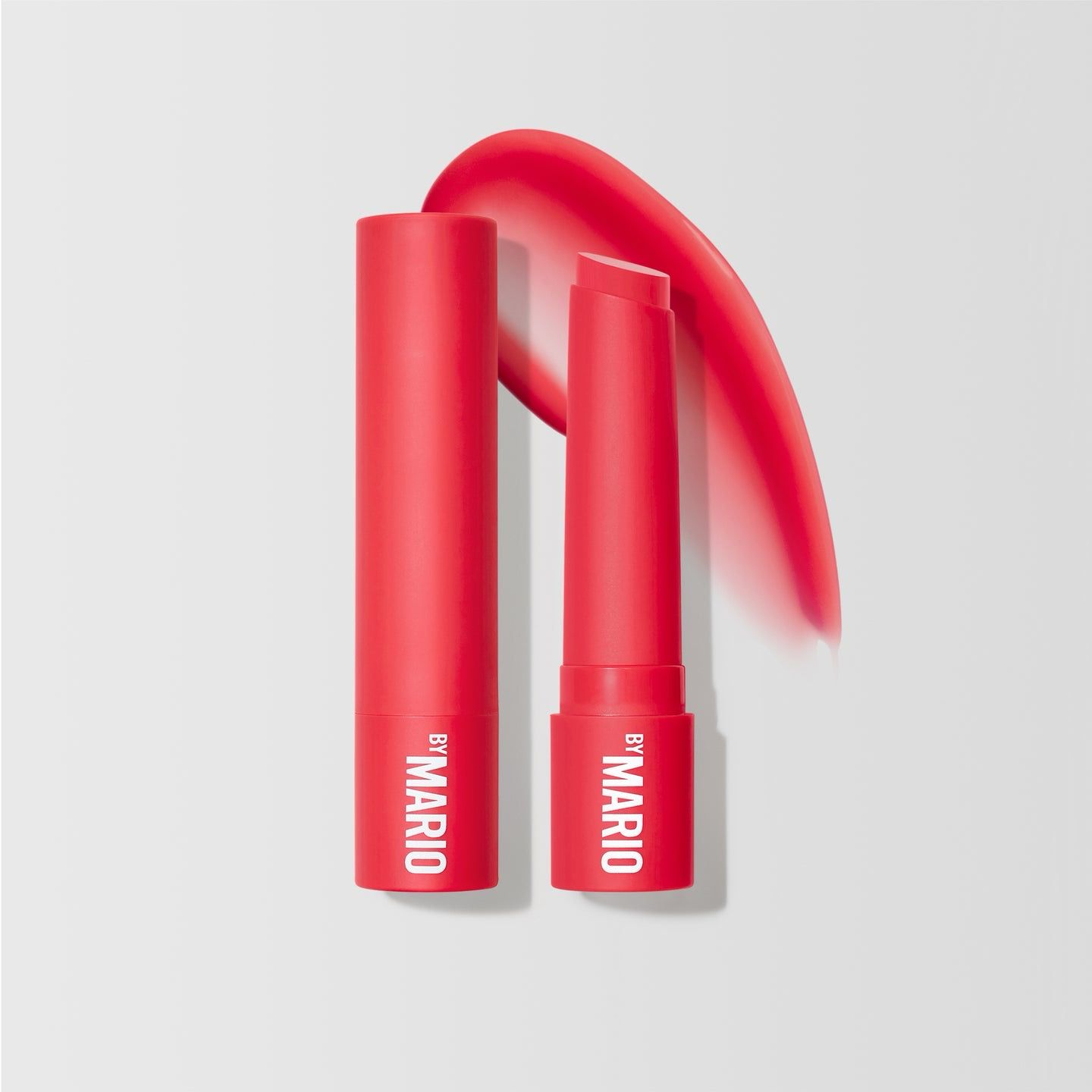 MAKEUP BY MARIO - MoistureGlow™ Plumping Lip Serum | Strawberry Glow - sheer poppy pink