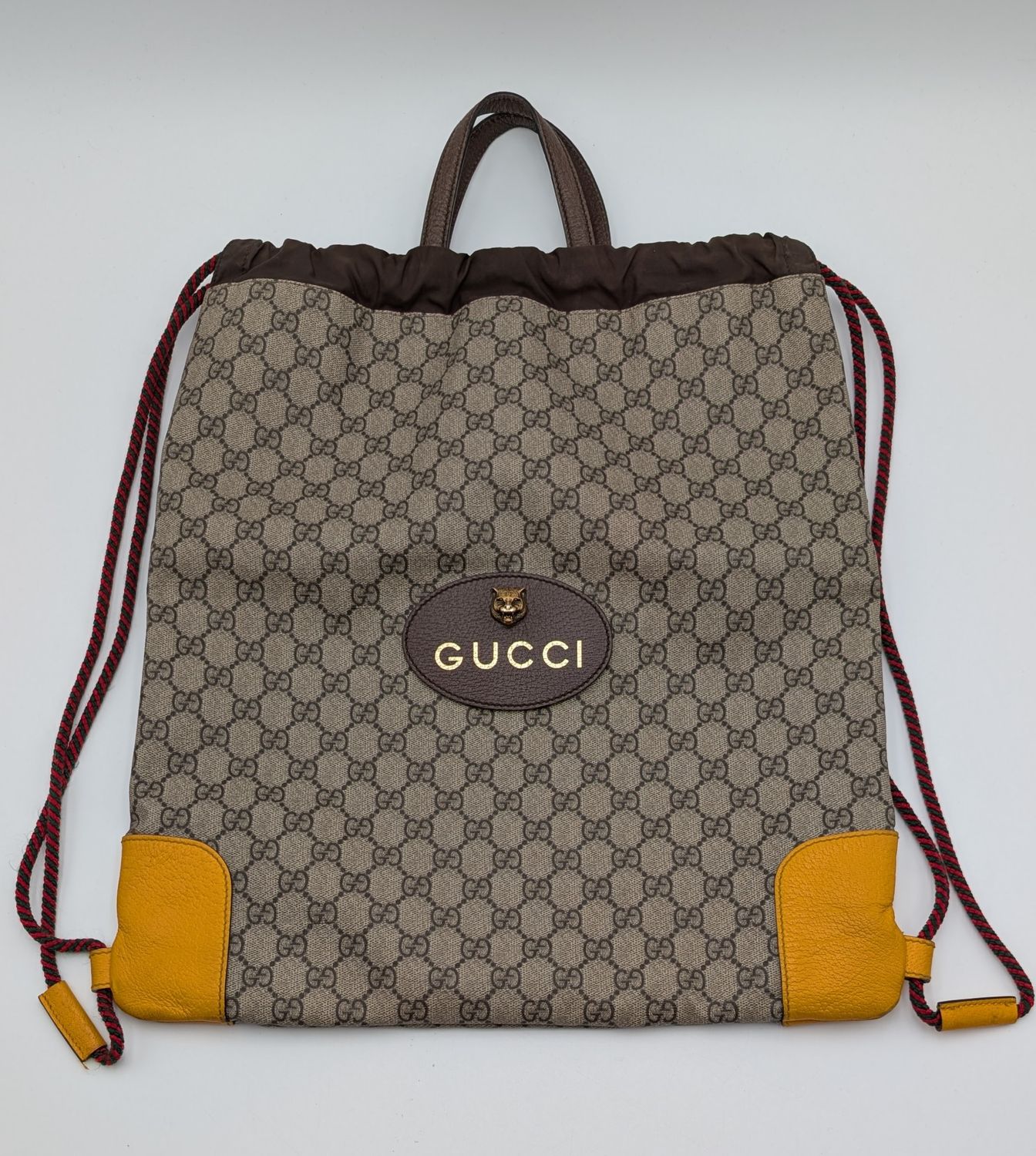 Gucci GG Supreme Neo Vintage Drawstring Backpack