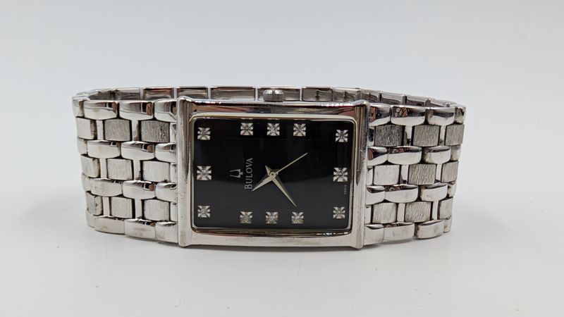Bulova A7 Mens Diamond Accented Watch Black Dial Stainless C860466