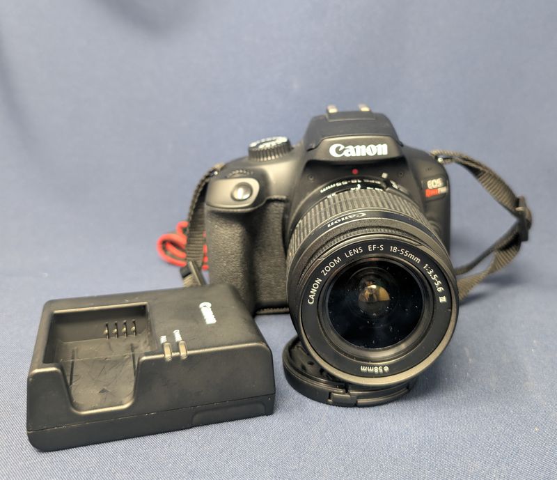 Canon Eos Rebel T100 Camera w/EF-S 18-55mm Lens 1:3.5-5.6 III
