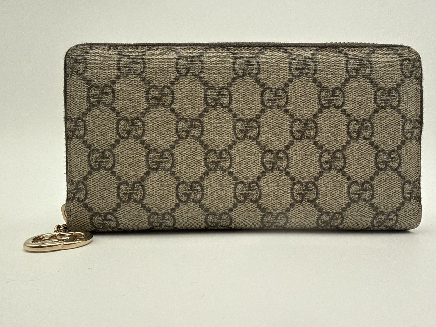 Gucci Supreme Canvas Zip Around Wallet Gucci Supreme Canvas Zip Around Wallet
