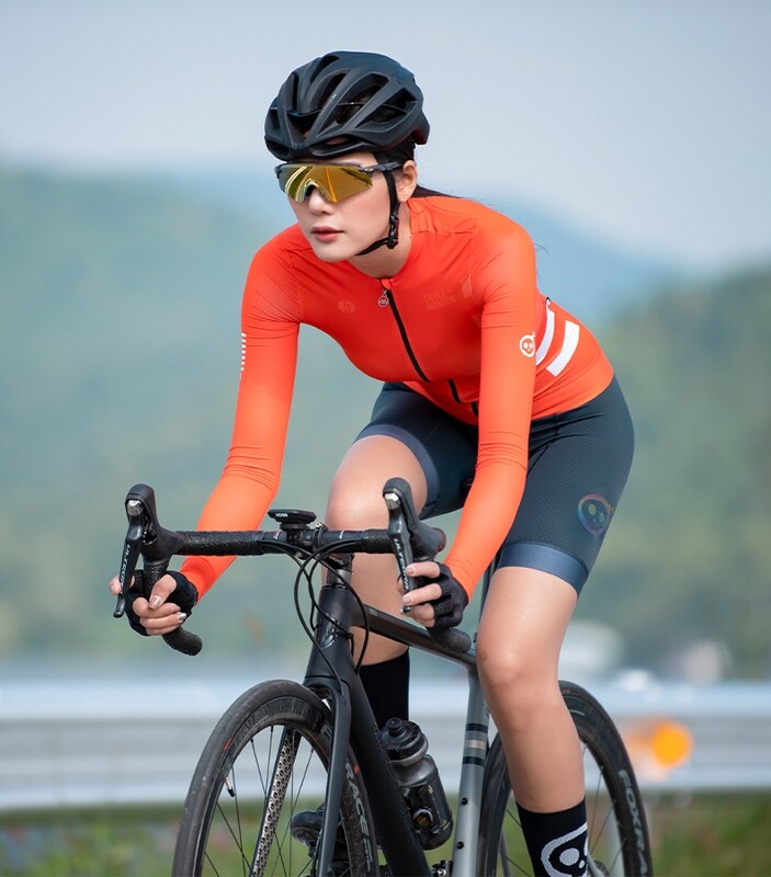 SKULL Cooling UPF50+ Thursday Orange Long Sleeve Jersey Women