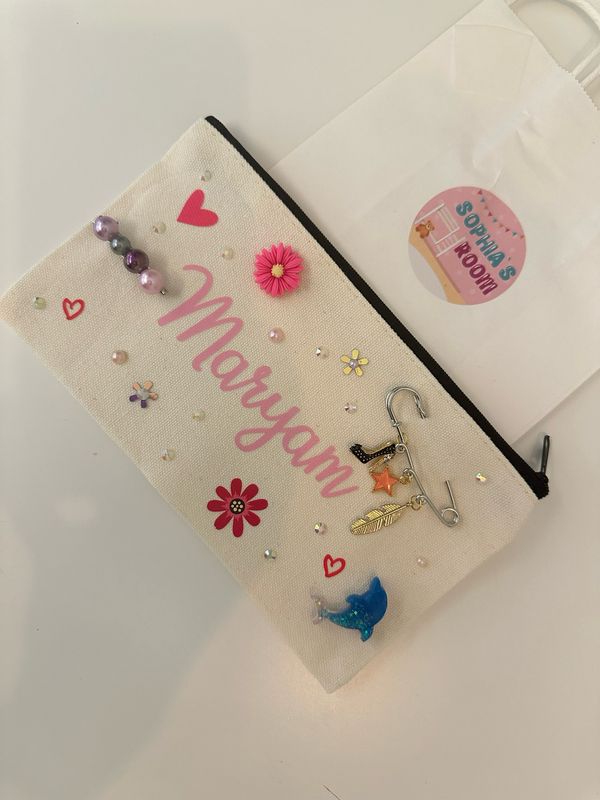 Pouch with charms