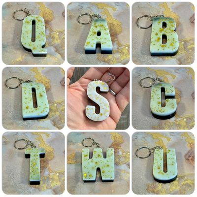 Sparkling White and Gold Letter Keyrings.