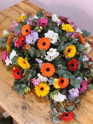 Colourful Gerbera & Freesia Casket Spray Funeral Flowers Tribute