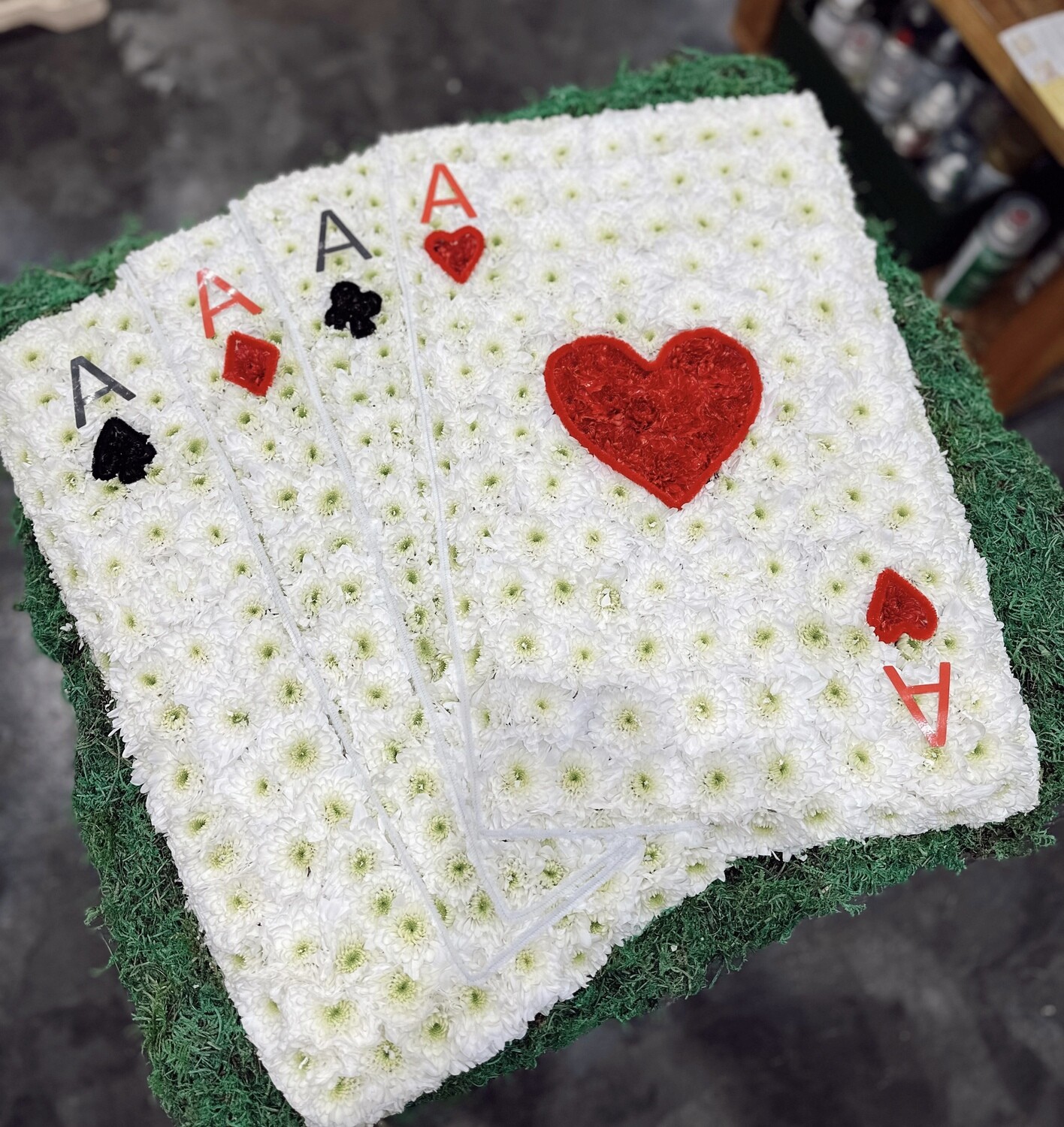 Hand of cards, Four of a kind playing card funeral tribute