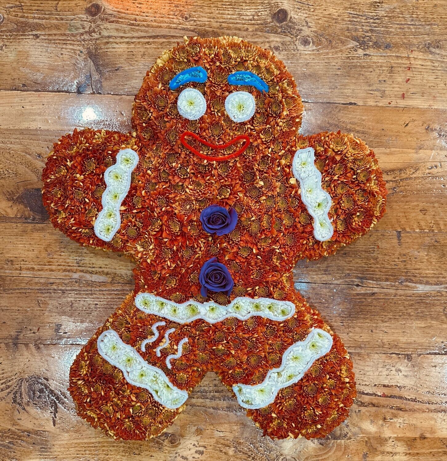 Gingerbread man funeral flowers