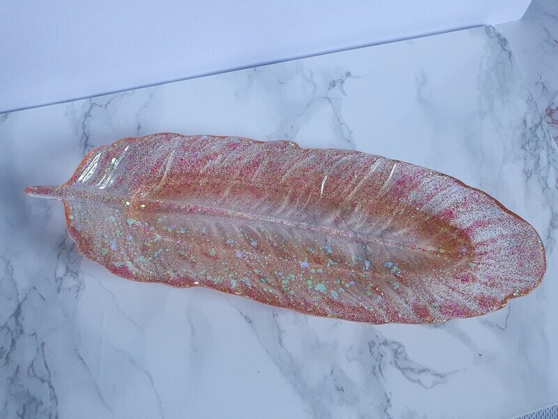 Plume en résine transparente à paillettes