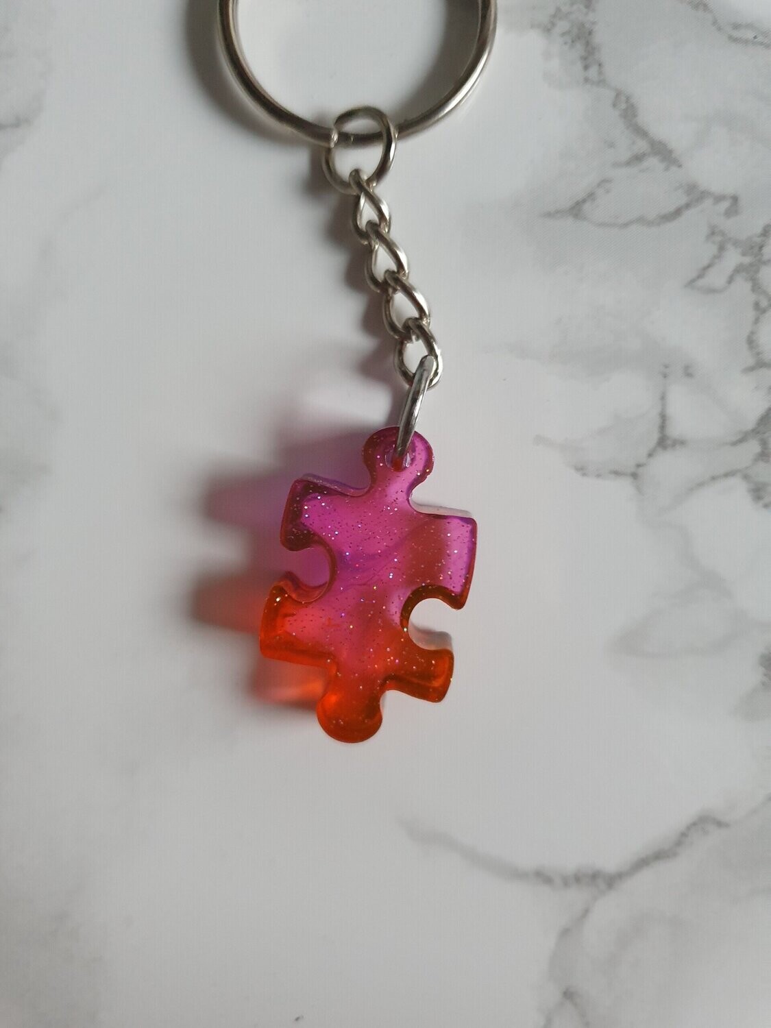 Porte clé puzzle rose orangé