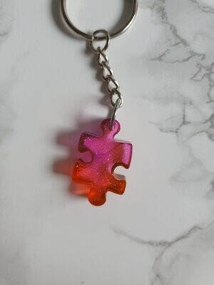 Porte clé puzzle rose orangé