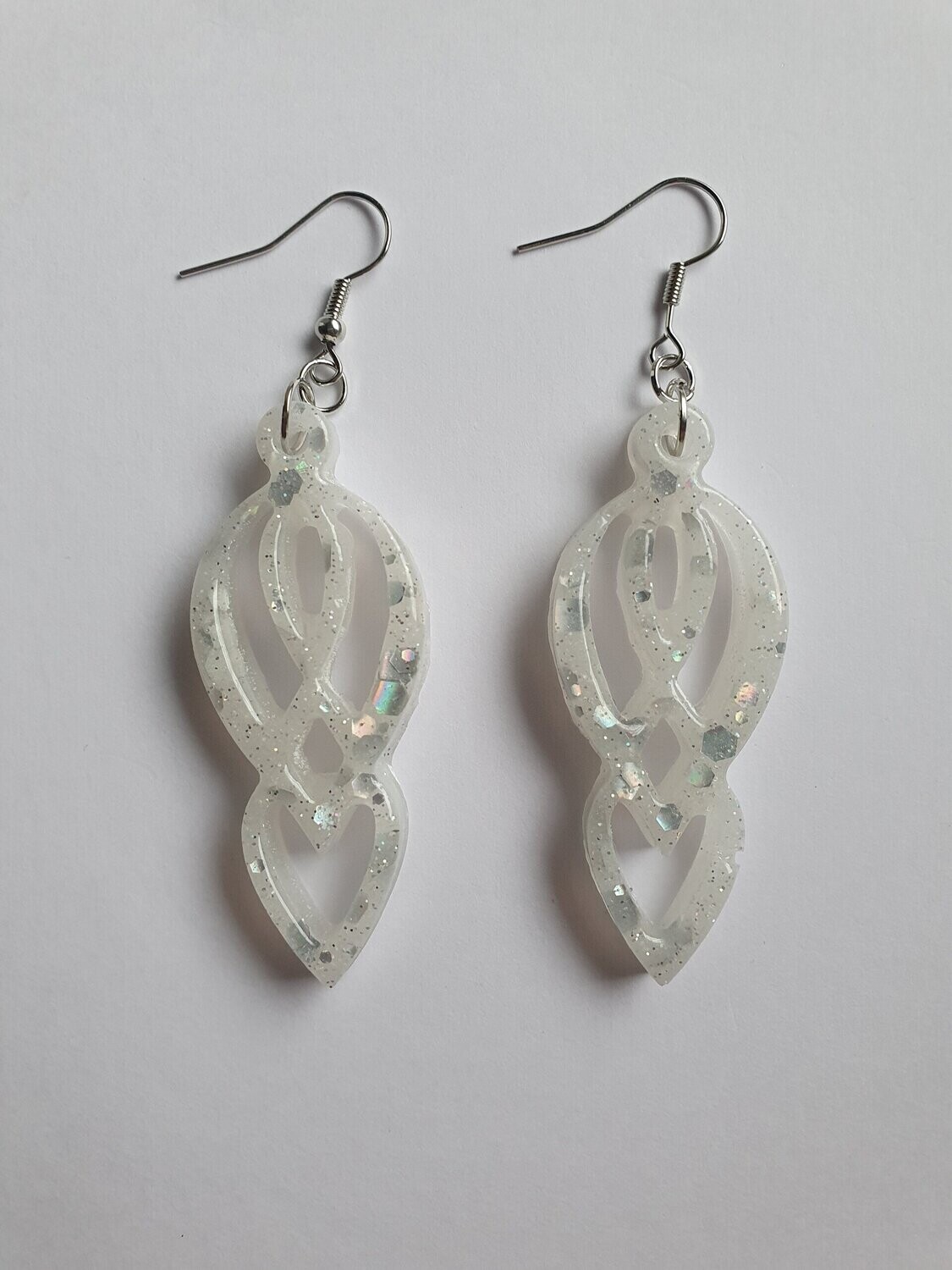 Boucles d'oreilles Silhouette blanches à paillettes