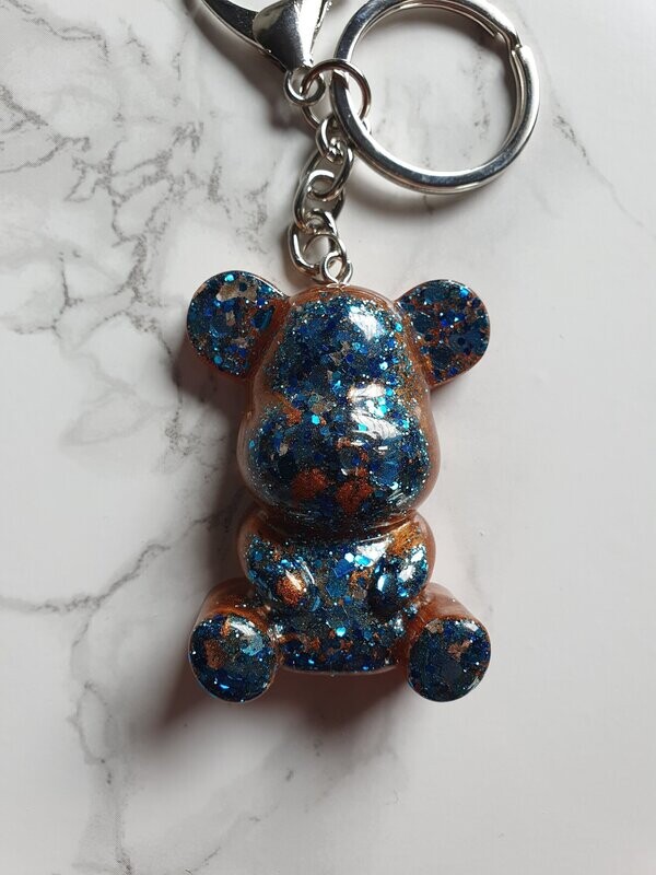 Porte clé maxi ourson bronze à paillettes bleues