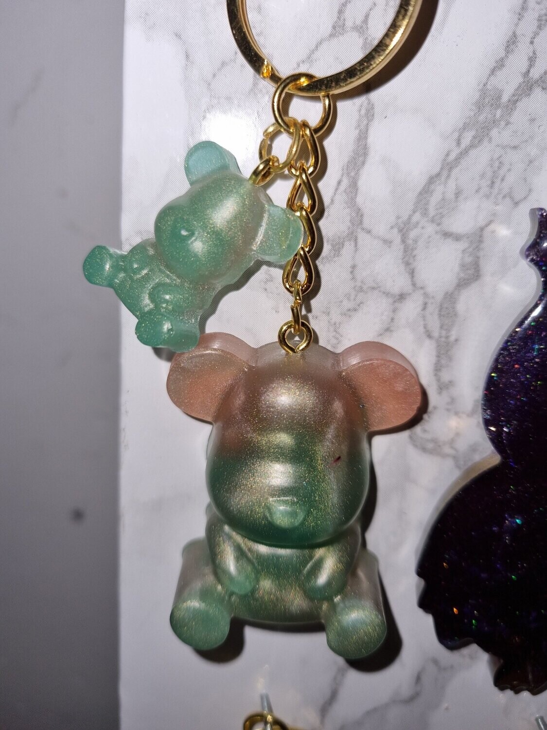 Porte clé Double ourson vert et rose doré