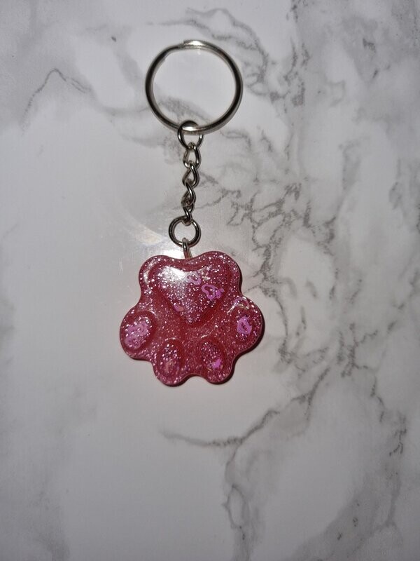 Porte de clé Patte rose à confettis