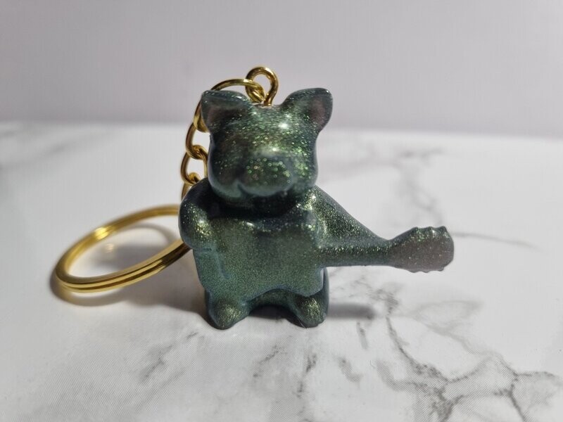 Porte clé Cochon vert métallisé