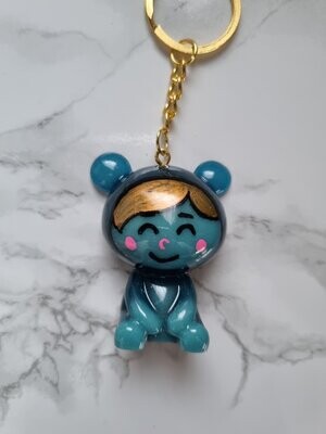 Porte clé Zanimos Ourson garçon bleu phosphorescent Porte clé Zanimos Ourson garçon bleu phosphorescent