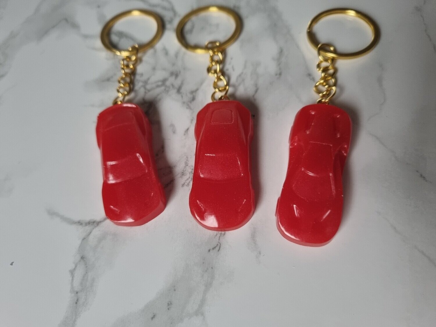 Porte clé voiture de sport rouge