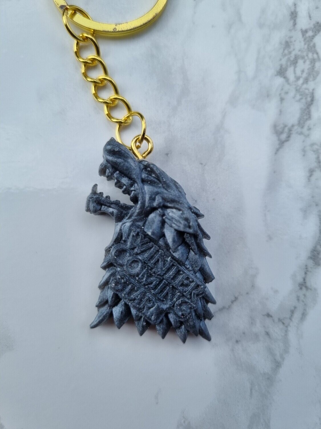 Porte clé GOT Stark anthracite