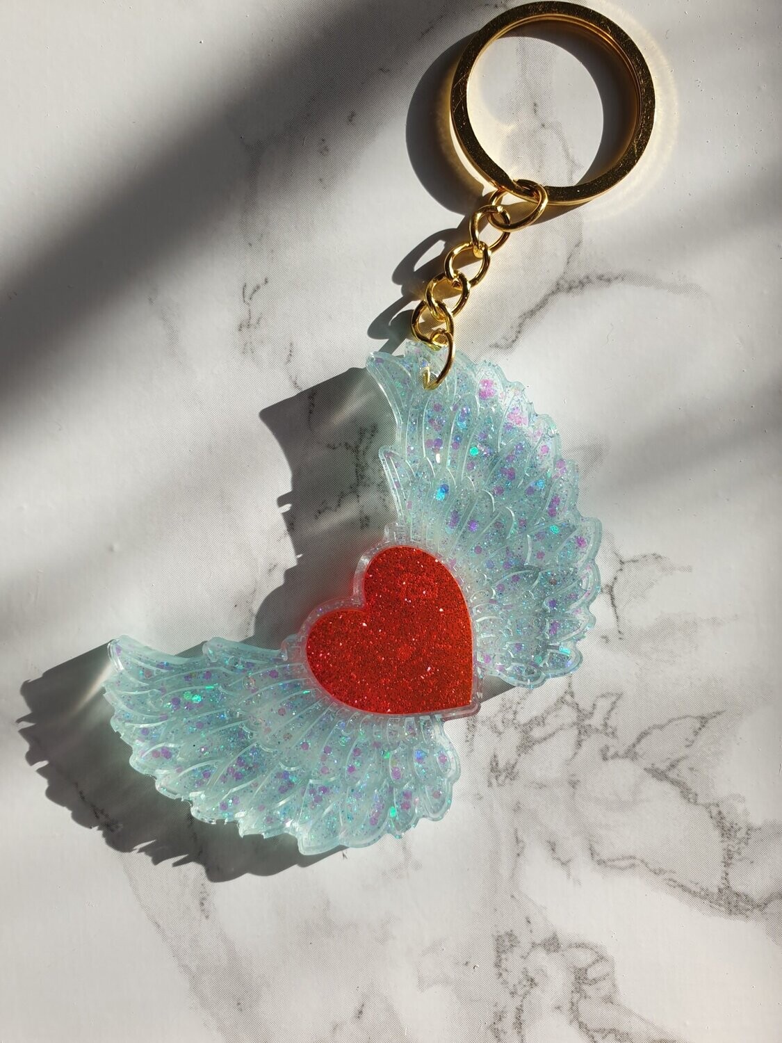 Porte clé Coeur ailé rouge pailleté