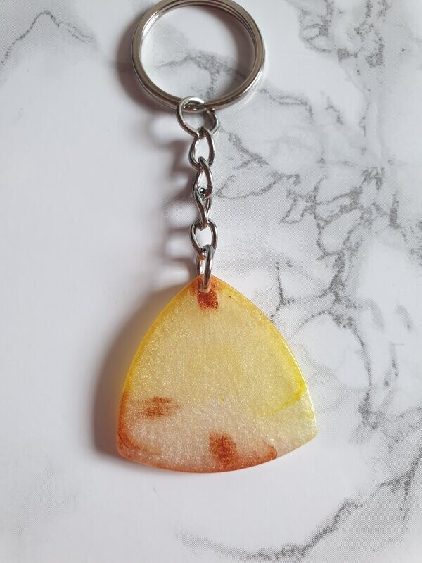 Porte clé médiator jaune moucheté brun