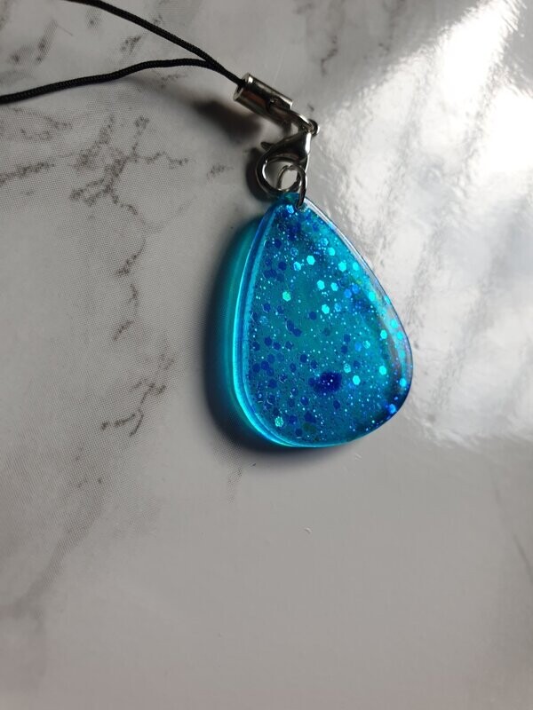 Porte clé médiator bleu pailleté holographique