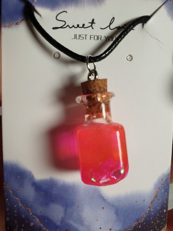 Collier potion magique fuschia