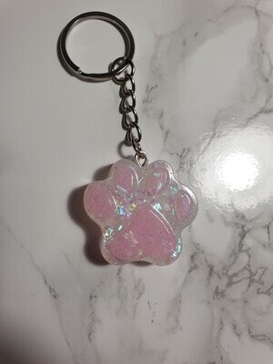 Porte de clé Patte rose et blanche pailletée