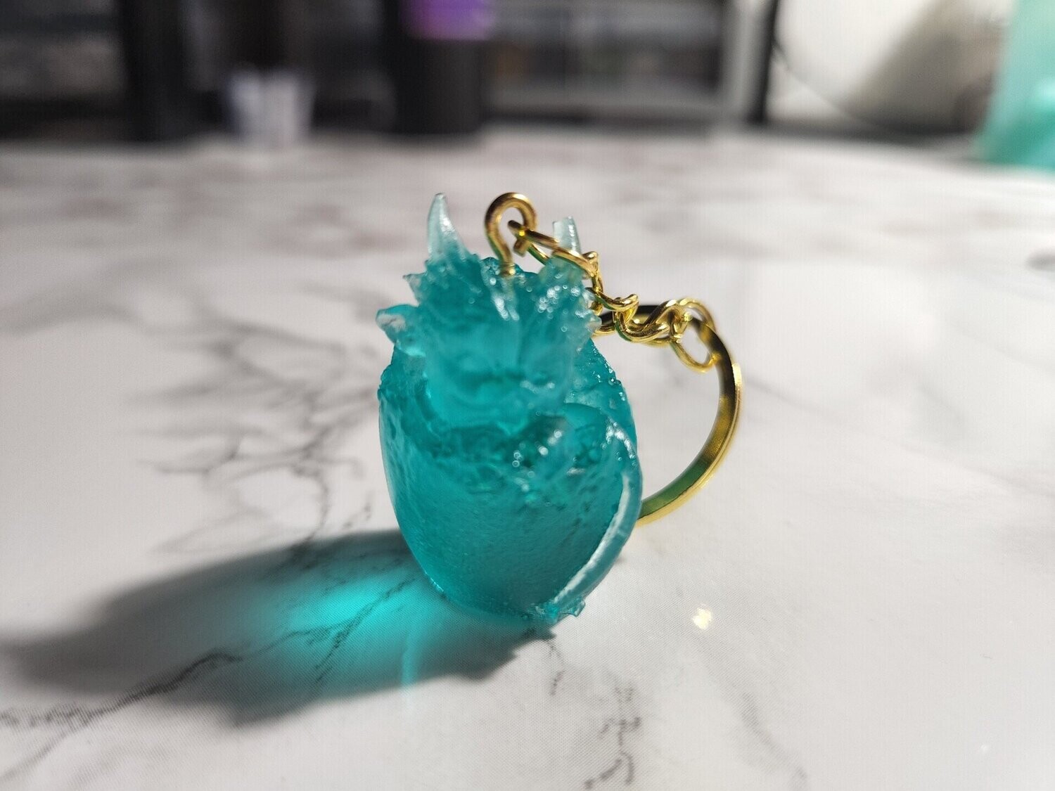 Porte clé bébé dragon bleu lagon