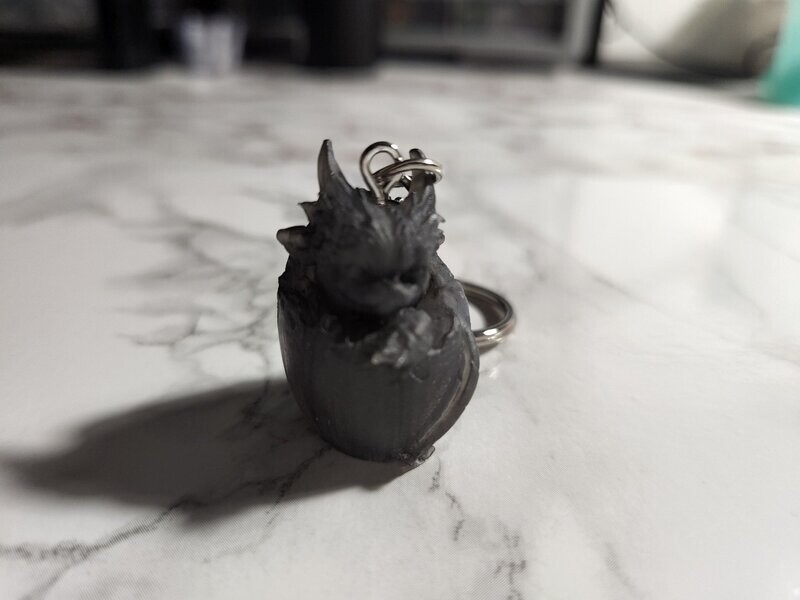 Porte clé bébé dragon noir