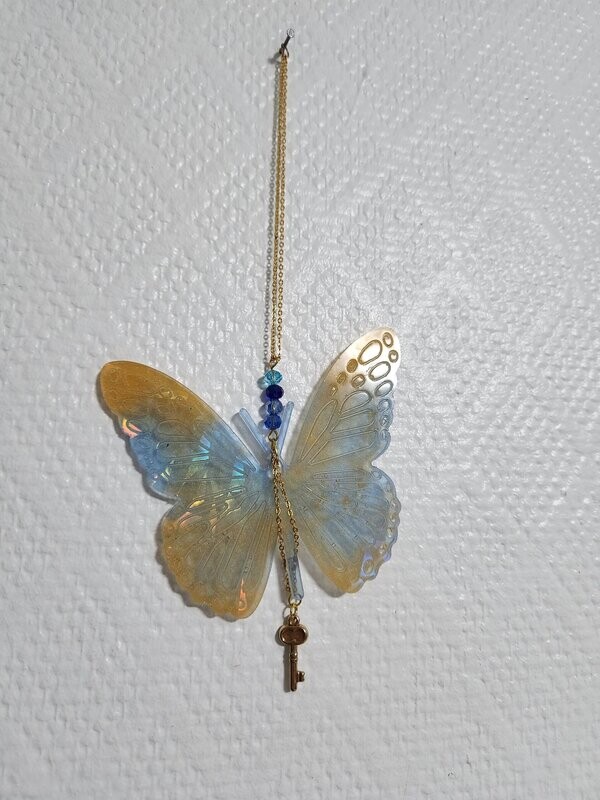 Papillon holographique or et bleu