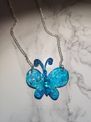 Collier papillon bleu pailleté chainette argenté