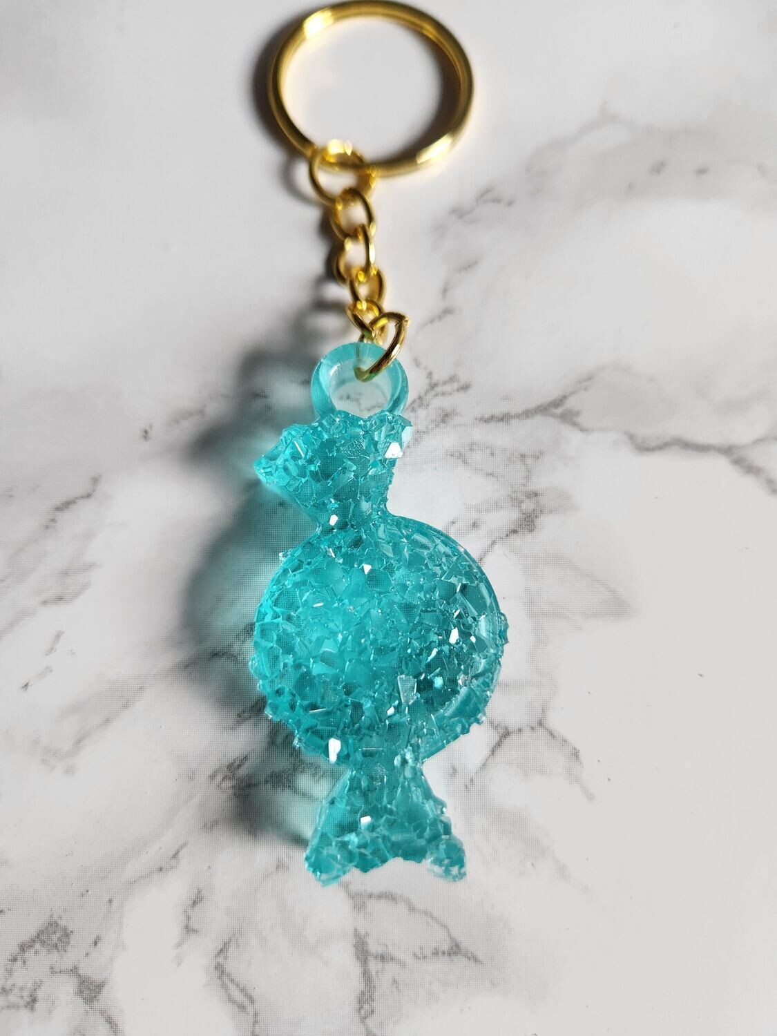 Porte clé bonbon bleu turquoise effet diamant